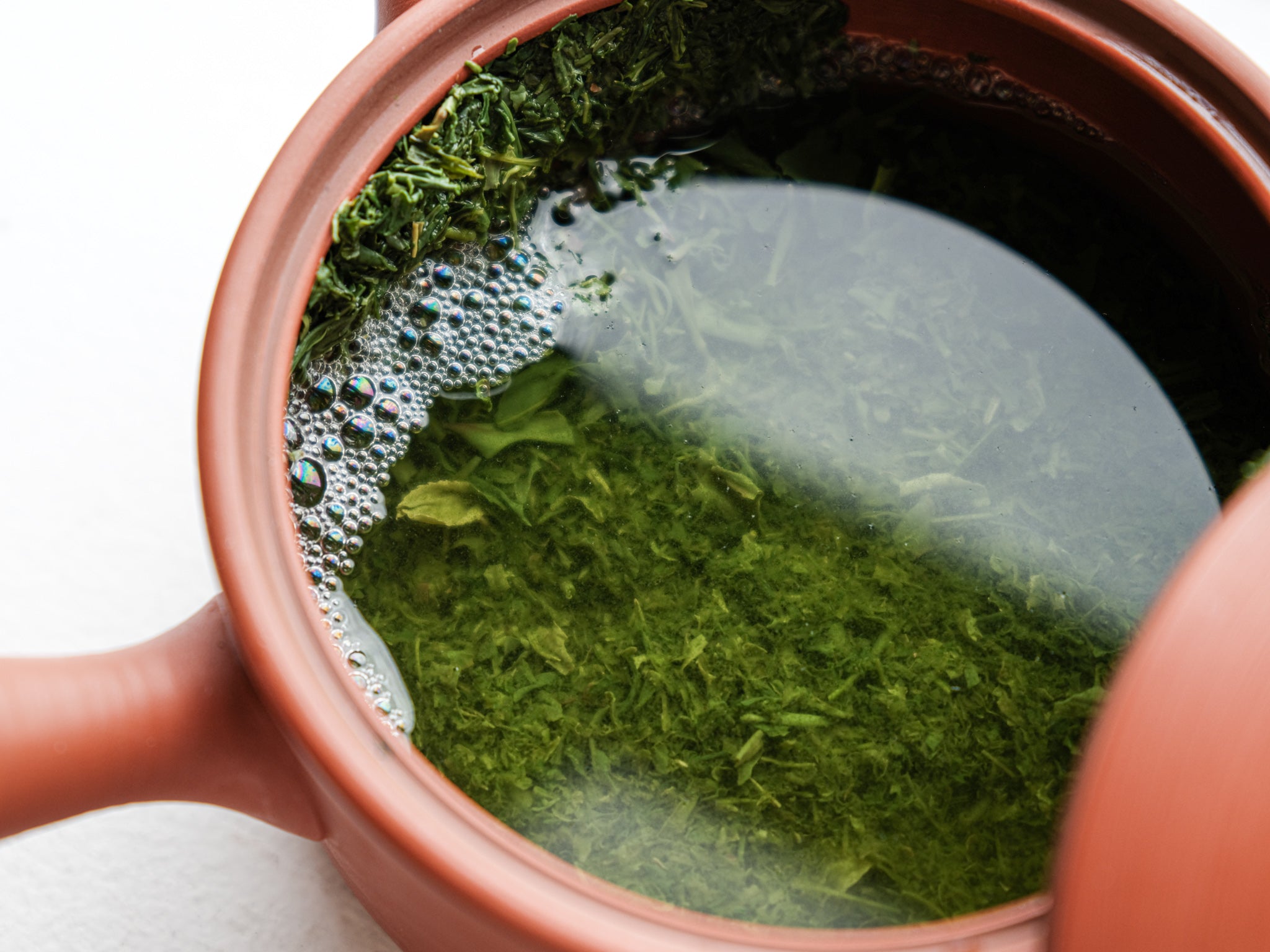 Traditional Japanese tea served in handcrafted ceramic cup