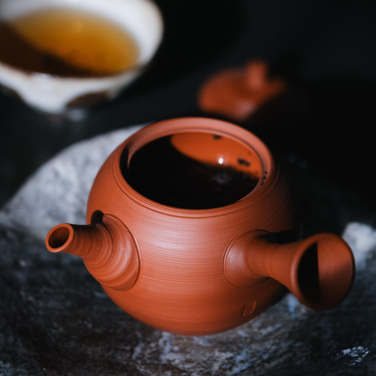 Freshly brewed Japanese tea in traditional teaware